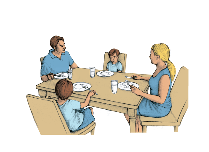 family eating dinner around a table